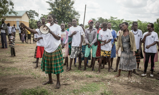 The peer mothers of Iriiri explaining their message after acting a skip on TB treatment awareness.